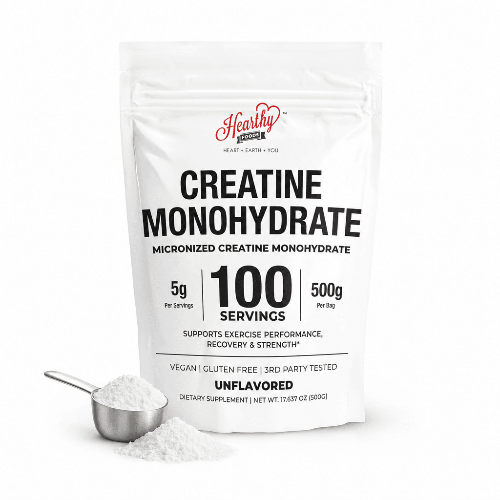 Rebuilt Hearthy Foods main image: 100 SERVINGS broken out as the dominant hero stat with a steel scoop and powder pile staged at the base